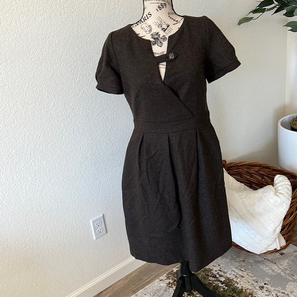 Women’s wool lined, zipper side dress with pockets.